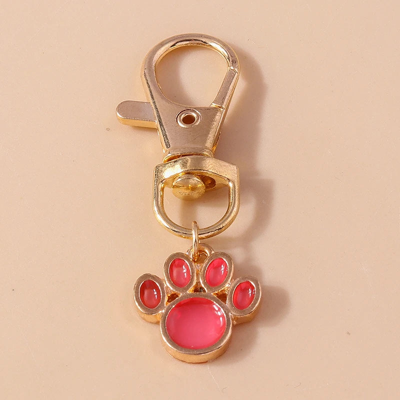 Porte-clés mignon de patte d'animal familier de chiot