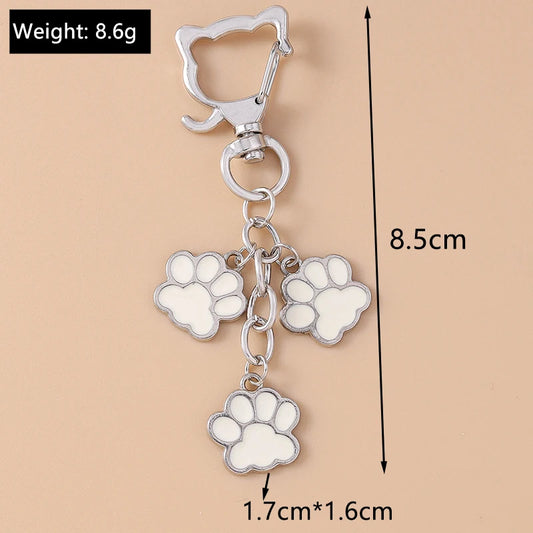 Porte-clés mignon de patte d'animal familier de chiot