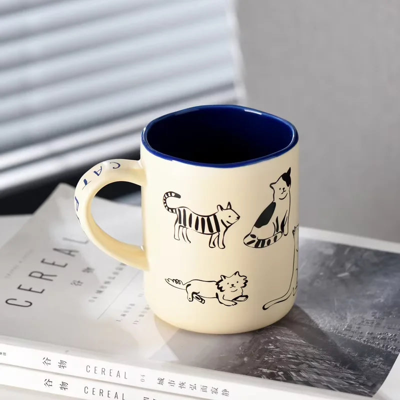 Keramik-Tasse mit Katzen- und Hundepaar