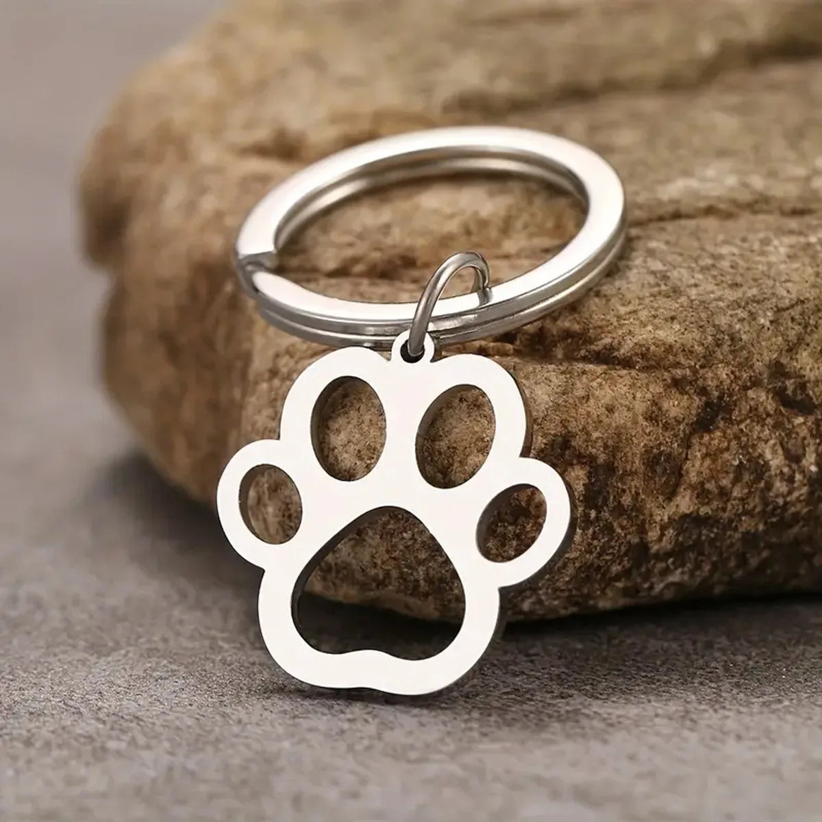 Llavero de pata de perro de acero inoxidable