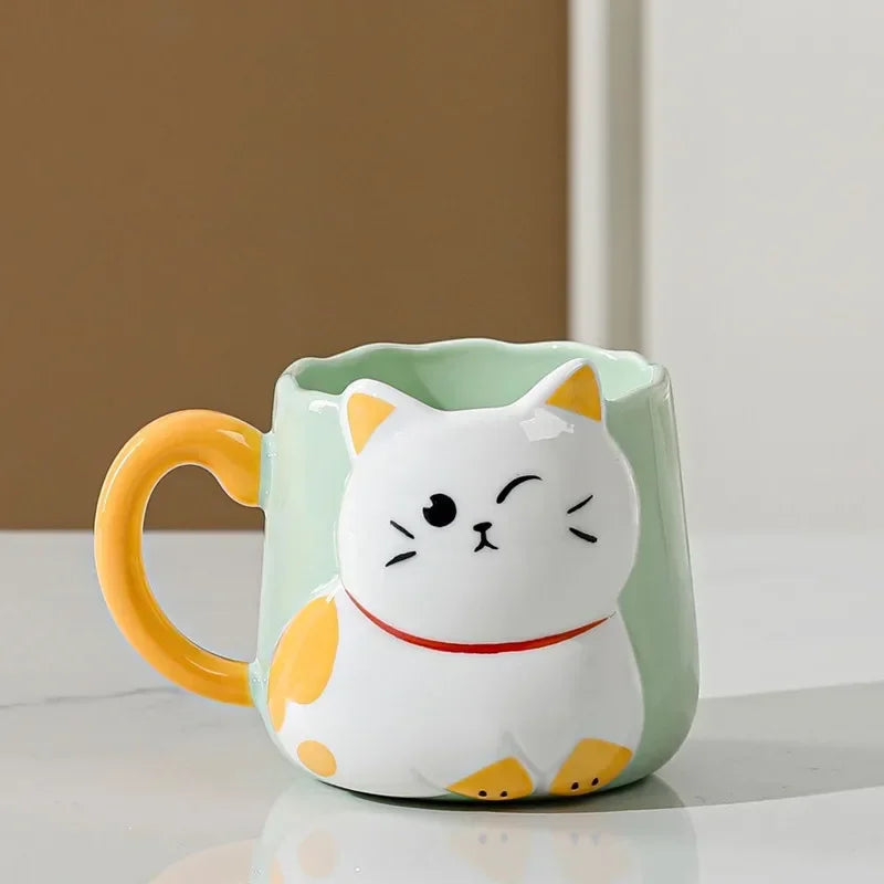 Tasse mignonne de chat de dessin animé