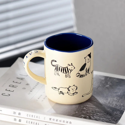 Keramik-Tasse mit Katzen- und Hundepaar