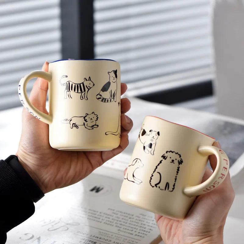 Keramik-Tasse mit Katzen- und Hundepaar