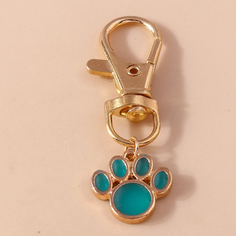 Porte-clés mignon de patte d'animal familier de chiot