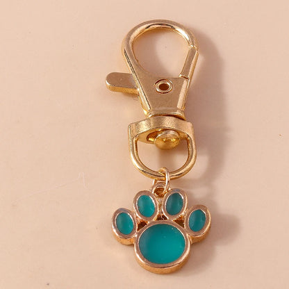 Porte-clés mignon de patte d'animal familier de chiot