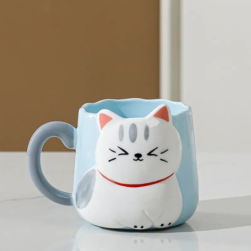Tasse mignonne de chat de dessin animé