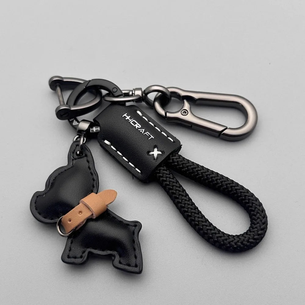 سلسلة مفاتيح على شكل كلب مع حلقة حبل