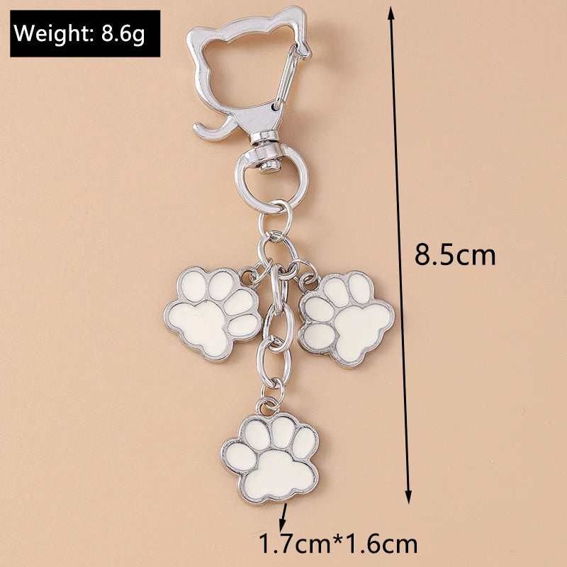 Porte-clés mignon de patte d'animal familier de chiot