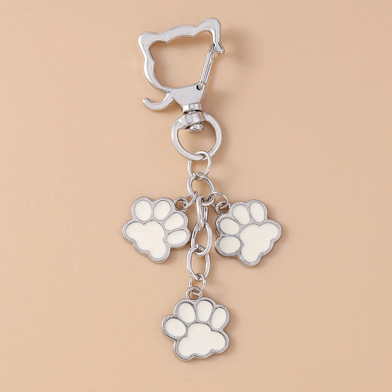 Porte-clés mignon de patte d'animal familier de chiot