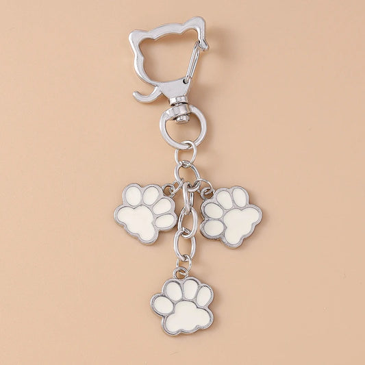Porte-clés mignon de patte d'animal familier de chiot